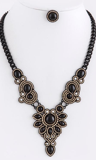 black and gold necklace and earrings