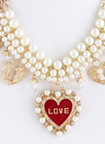 pearls and gold heart shaped necklace